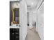 This ensuite bathroom includes an enclosed shower and a vanity with an accent mirror at 999 Rushing Ln # 13, Fort Mill, SC 29715