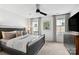 Comfortable bedroom with a queen-size bed, ceiling fan, and lots of natural light at 999 Rushing Ln # 13, Fort Mill, SC 29715