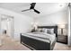 This bedroom offers a modern aesthetic with neutral walls, minimalist decor, and a ceiling fan at 999 Rushing Ln # 13, Fort Mill, SC 29715