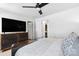 This bedroom features modern decor, a mounted flatscreen, and an ensuite bathroom at 999 Rushing Ln # 13, Fort Mill, SC 29715