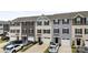 Well-maintained townhome exteriors with neutral colors, garages, and landscaping at 999 Rushing Ln # 13, Fort Mill, SC 29715