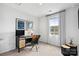 Modern office with a stylish desk, decor, and a large window at 999 Rushing Ln # 13, Fort Mill, SC 29715