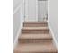 Carpeted stairs leading to an upper level bathroom with a white shower curtain at 999 Rushing Ln # 13, Fort Mill, SC 29715