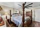 Cozy bedroom with hardwood floors, a ceiling fan, and nice windows at 110 Heritage Dr, Kings Mountain, NC 28086
