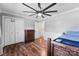 Bedroom features hardwood floors and a ceiling fan at 110 Heritage Dr, Kings Mountain, NC 28086