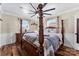 Beautiful bedroom with wood floors, ceiling fan and lots of light at 110 Heritage Dr, Kings Mountain, NC 28086