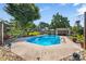Backyard swimming pool featuring cool, clear blue water, surrounding lounge furniture and mature landscaping at 110 Heritage Dr, Kings Mountain, NC 28086