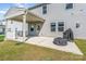 Back patio featuring a built-in overhang and a grill at 11116 Godwit Ln, Charlotte, NC 28278