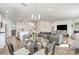Open-concept living space with a dining area, kitchen, and living room at 11116 Godwit Ln, Charlotte, NC 28278