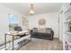 Charming home office featuring a modern desk, stylish lighting, and comfortable seating at 11116 Godwit Ln, Charlotte, NC 28278