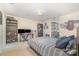 Nicely decorated bedroom with bed, desk, shelving and Star Wars themed decorations at 127 Fantasy Ln, Mooresville, NC 28117