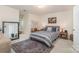 Bedroom features nice rug, Queen bed, end tables and large mirror at 127 Fantasy Ln, Mooresville, NC 28117