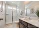 Well-lit bathroom featuring a glass-enclosed shower and a modern vanity at 129 Hawks Creek Pkwy, Fort Mill, SC 29708