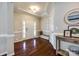 Elegant foyer featuring hardwood floors, crown molding, and abundant natural light at 129 Hawks Creek Pkwy, Fort Mill, SC 29708