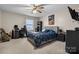 This bedroom includes a bed, desk, and ceiling fan for comfort at 1330 5Th Ne St # 11, Hickory, NC 28601