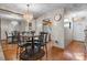 Chic dining area with chandelier and mirrored accent wall at 1330 5Th Ne St # 11, Hickory, NC 28601