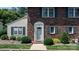 Close-up of a brick home with well-maintained landscaping at 1330 5Th Ne St # 11, Hickory, NC 28601