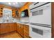 Traditional kitchen features warm cabinetry and modern appliances at 1330 5Th Ne St # 11, Hickory, NC 28601