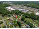 Aerial view of a home with a pool and lush green landscaping at 1613 Spangler Dr, Shelby, NC 28150