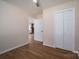 Neutral bedroom featuring wood-look floors, closet, and abundant natural light at 1613 Spangler Dr, Shelby, NC 28150