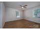 Bedroom features hardwood-style floors, neutral walls, and windows for natural light at 1613 Spangler Dr, Shelby, NC 28150