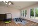 Bonus room featuring hardwood-style floors, neutral walls, and windows for natural light at 1613 Spangler Dr, Shelby, NC 28150