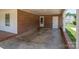 Covered carport featuring a brick facade and providing covered access to the home at 1613 Spangler Dr, Shelby, NC 28150