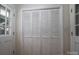 Hallway features white door and 4 panel bifold door leading into the living area at 1613 Spangler Dr, Shelby, NC 28150
