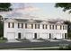 New townhome construction with white siding, black shutters and complementary landscaping at 1913 C Tranquility Cir, Newton, NC 28658