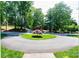 Circular driveway featuring a beautiful tree in center of well maintained yard at 2024 5Th Street Nw Pl, Hickory, NC 28601