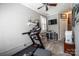 Exercise room with a treadmill, gray brick wall, and natural light at 2024 5Th Street Nw Pl, Hickory, NC 28601