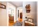Hallway view of interior home, leading to living spaces with hardwood floors at 2024 5Th Street Nw Pl, Hickory, NC 28601