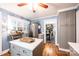 Bright kitchen features stainless steel appliances, an island, and open access to the dining room at 2024 5Th Street Nw Pl, Hickory, NC 28601