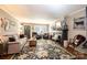 Inviting living room featuring a decorative fireplace, plush seating, and a stylish area rug at 2024 5Th Street Nw Pl, Hickory, NC 28601
