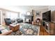 Bright living room features a fireplace, cozy seating, and stylish decor elements at 2024 5Th Street Nw Pl, Hickory, NC 28601