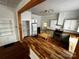 Bright kitchen with a large countertop island, stainless steel appliances and built-in storage at 208 S Ransom St, Gastonia, NC 28052