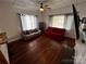 Cozy living room with hardwood floors, ample natural light, and comfortable seating at 208 S Ransom St, Gastonia, NC 28052