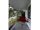 Front porch with a porch swing and a red pillow at 208 S Ransom St, Gastonia, NC 28052