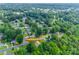 Aerial shot of the property surrounded by trees in a residential neighborhood at 2111 Parkdale Ave, Gastonia, NC 28052