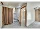 Finished basement with carpeted stairs, paneled walls, and open doorway at 2111 Parkdale Ave, Gastonia, NC 28052