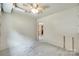 Basement room with carpeted floor, ceiling fan, and paneled walls at 2111 Parkdale Ave, Gastonia, NC 28052