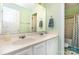Bright bathroom featuring a double sink vanity, a large mirror, and a shower-tub combination, providing functionality at 270 Kilmer Ln, Mooresville, NC 28115
