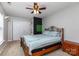 Comfortable bedroom featuring neutral walls, a ceiling fan, and closet doors, creating a cozy atmosphere at 270 Kilmer Ln, Mooresville, NC 28115
