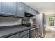 Kitchen with dark cabinets, stainless steel appliances, and sleek countertops at 270 Kilmer Ln, Mooresville, NC 28115