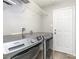 Laundry room featuring Maytag washer and dryer, and a storage shelf at 270 Kilmer Ln, Mooresville, NC 28115
