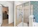 Well-lit bathroom featuring a glass-enclosed shower and stylish tiling at 344 Kennebel Pl, Fort Mill, SC 29715