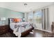 Comfortable bedroom with large windows and stylish decor at 344 Kennebel Pl, Fort Mill, SC 29715