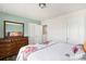 Well-lit bedroom featuring ample storage and neutral decor at 344 Kennebel Pl, Fort Mill, SC 29715