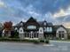 Stately community clubhouse with elegant architectural details and landscaping at 344 Kennebel Pl, Fort Mill, SC 29715