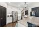 Contemporary kitchen with stainless steel appliances, granite countertops, and ample cabinet space for all your culinary needs at 344 Kennebel Pl, Fort Mill, SC 29715